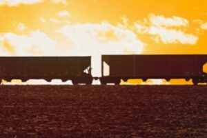 Train cars against the sunset