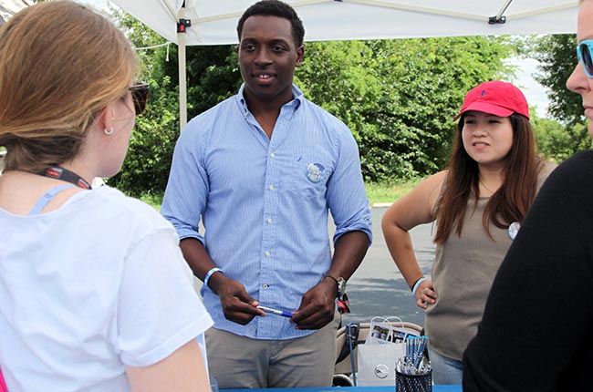 capcog staff interacting with public at event